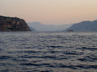 Exit to Mediterranean from Marmaris bay at sunset photo elenameg.com