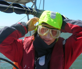 Meg Aitken uses diving gear to avoid blowing sand photo elenameg.com